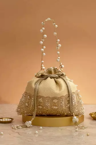 Cream embroidered  silk potli bag