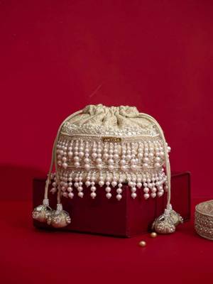 Ivory pearl embroidered  silk potli bag 1