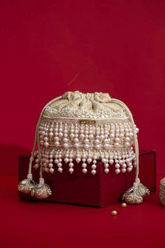 Ivory pearl embroidered  silk potli bag