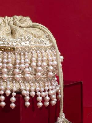 Ivory pearl embroidered  silk potli bag 4