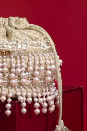 Ivory pearl embroidered  silk potli bag