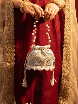 Beige embroidered  silk potli bag 2