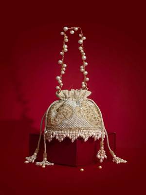 Beige embroidered  silk potli bag 1