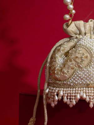 Beige embroidered  silk potli bag 3