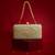 Beige floral embroidered silk clutch