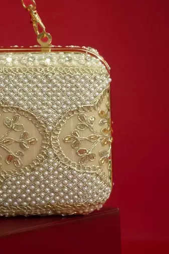 Beige floral embroidered silk clutch