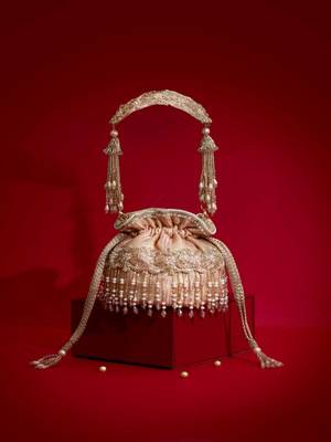Pink embroidered  silk potli bag 1