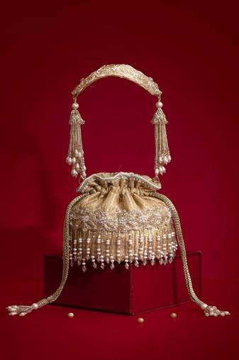 Beige embroidered  silk potli bag