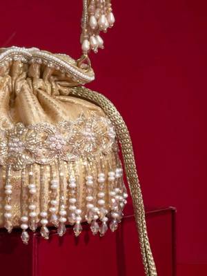 Beige embroidered  silk potli bag 3