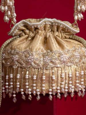 Beige embroidered  silk potli bag 4