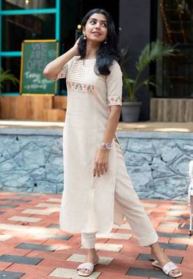 Off white embroidered cotton kurta and pant set 1