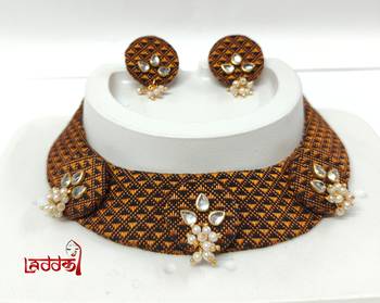 Golden handloom fabric jewelery 1