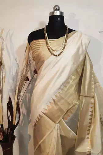 Cream zari woven temple border assam silk blend saree with blouse