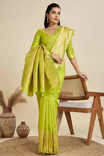 Light green color zari woven kanjivaram silk blend saree with blouse