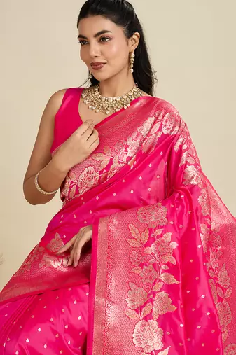 Pink color zari woven kanjivaram silk blend saree with blouse