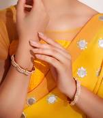 Gold plated red stone kundan bangles