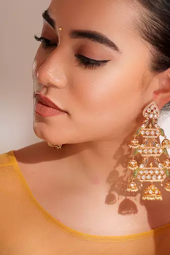 Gold plated kundan dangler earrings