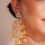 Gold plated kundan dangler earrings