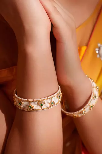Gold plated green stone kundan bangles