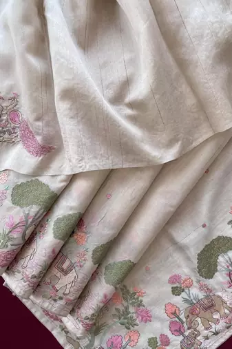 Beigepure loom tussar with all over forest style hand embroidery
