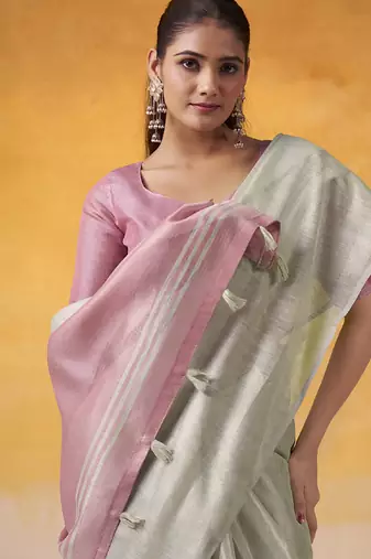 Off-white tissue silk with beautiful tussle on pallu casual & office wear saree