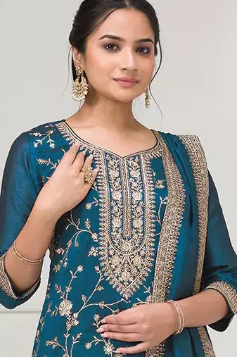 Dark aqua blue embroidered faux chiffon salwar suit