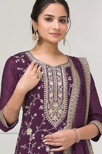 Purple embroidered faux chiffon salwar suit