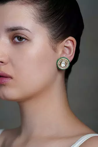 Gold plated kundan green stone stud earrings