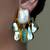 Gold plated green stone earrings