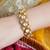 Gold plated kundan bangle