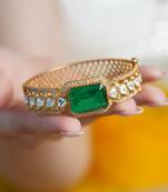 Gold plated kundan green stone bangle