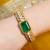 Gold plated kundan green stone bangle