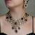 Gold plated kundan purple stone necklace set