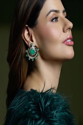 Gold plated kundan green stone earrings