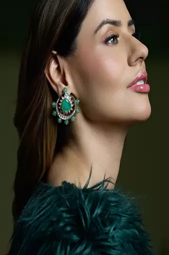 Gold plated kundan green stone earrings