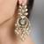 Gold plated kundan pearl earrings