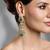 Gold plated kundan green stone earrings