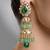 Gold plated kundan green stone earrings