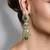 Gold plated kundan green stone earrings