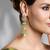Gold plated kundan green stone earrings