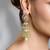 Gold plated kundan green stone earrings