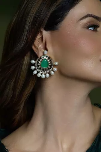 Gold plated kundan green stone earrings