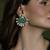 Gold plated kundan green stone earrings