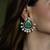Gold plated kundan green stone earrings