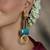 Gold plated blue stone earrings
