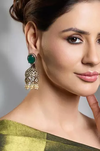 Gold plated kundan green stone earrings