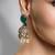 Gold plated kundan green stone earrings