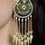 Gold plated kundan green stone earrings