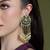 Gold plated kundan green stone earrings