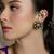 Gold plated kundan green stone earrings